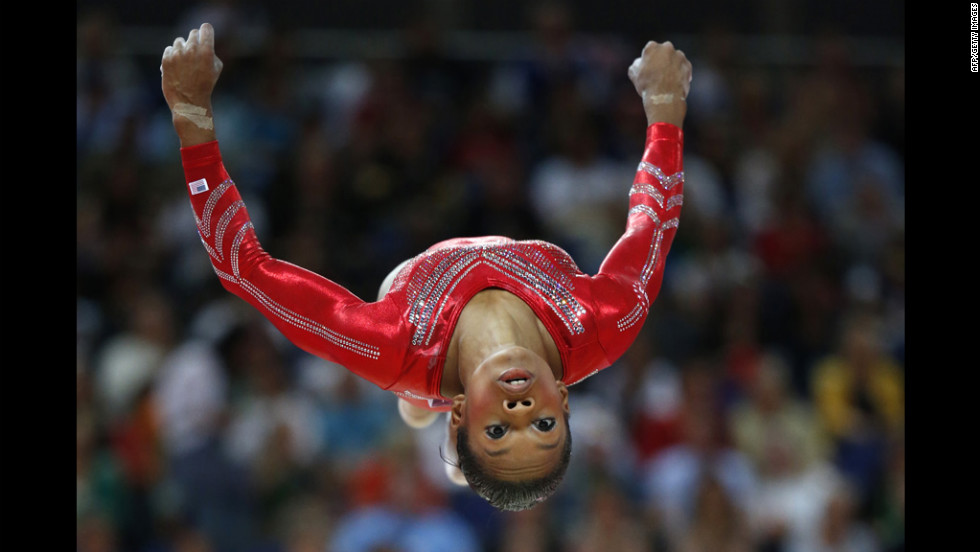 U.S. gymnast Gabrielle Douglas performs on the beam during the women&#39;s team final of the gymnastics event.