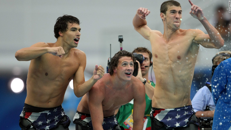 Phelps shouts encouragement to teammates in the 4x200 freestyle in Beijing.