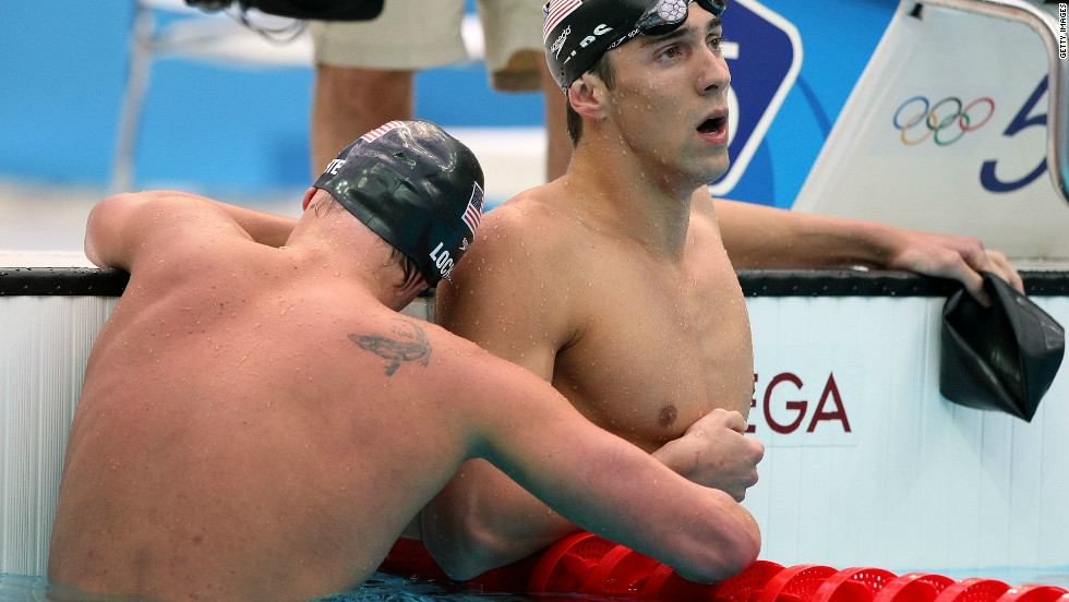 Phelps is hugged by teammate Ryan Lochte in 2008 after winning the 200-meter medley in Beijing. Phelps won eight gold medals in Beijing -- the most-ever in one Olympics.