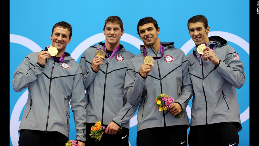 From left, gold medallists Ryan Lochte, Conor Dwyer, Ricky Berens and Michael Phelps pose on the podium during the medal ceremony for the Men&#39;s 4x200-meter freestyle relay final on Tuesday.