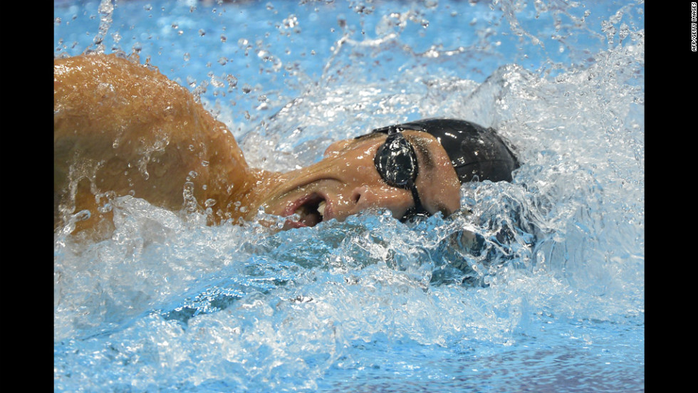 American Michael Phelps competes in the men&#39;s 4x200-meter freestyle relay final. 