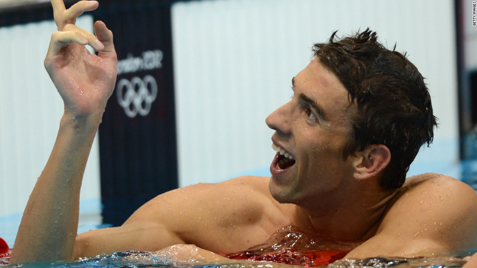 Phelps celebrates in 2012 after becoming the most-decorated Olympic athlete in history. He had just won his 19th medal after the 4x200 freestyle.