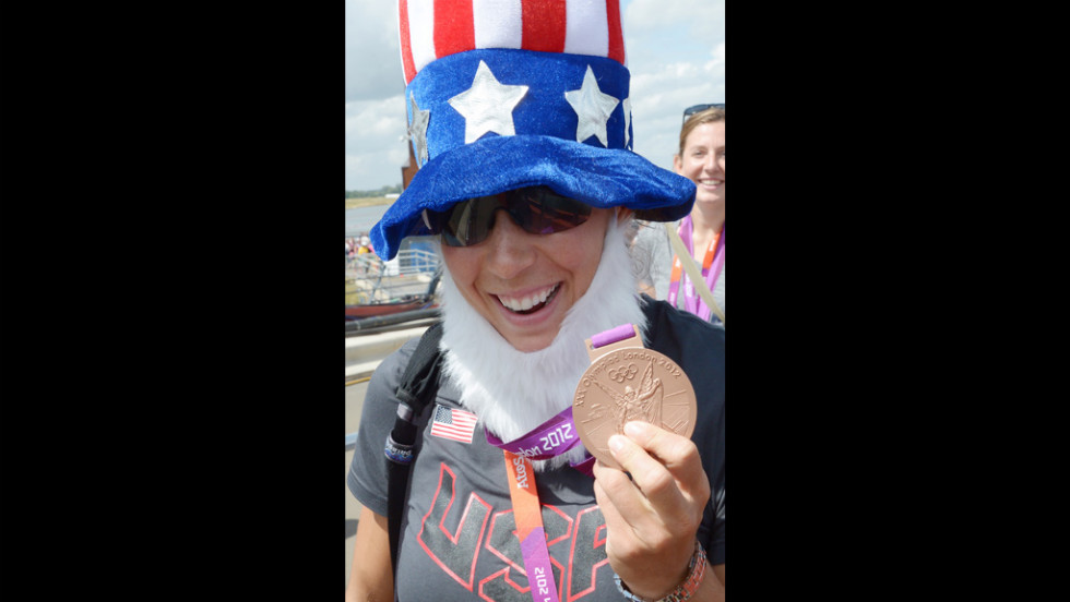 A member of the U.S. team wears an Uncle Sam getup after she and her teammates won the gold medal in the women&#39;s eight rowing final.