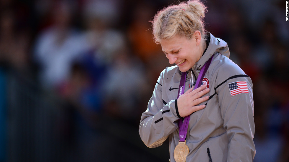 American Kayla Harrison reacts on the podium after winning the gold medal in women&#39;s judo on Thursday.