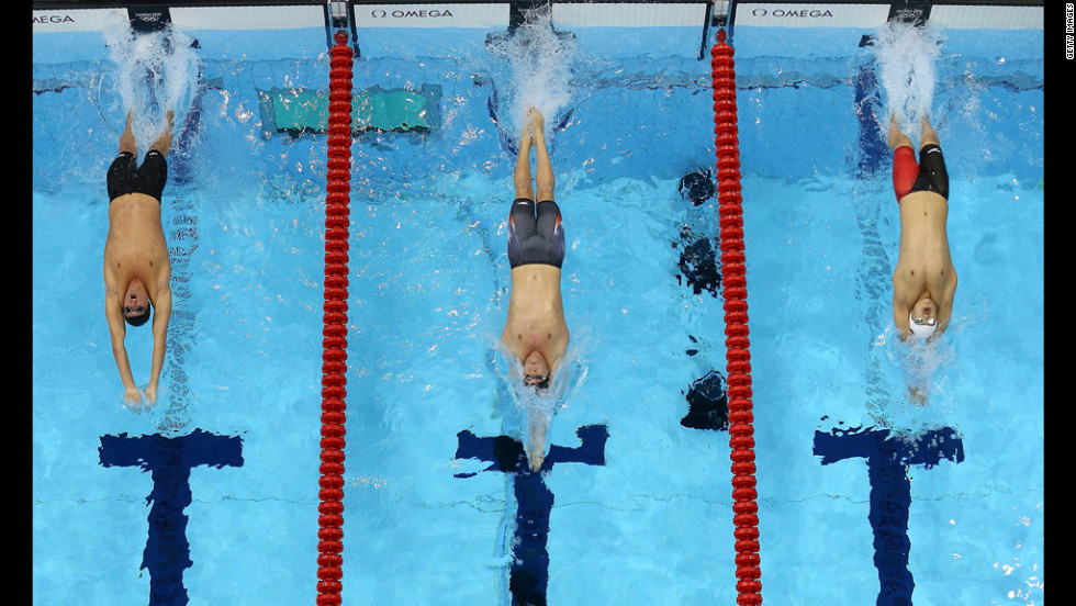 Left to right: Ryan Lochte, Tyler Clary and China&#39;s Fenglin Zhang compete in the men&#39;s 200-meter backstroke final.