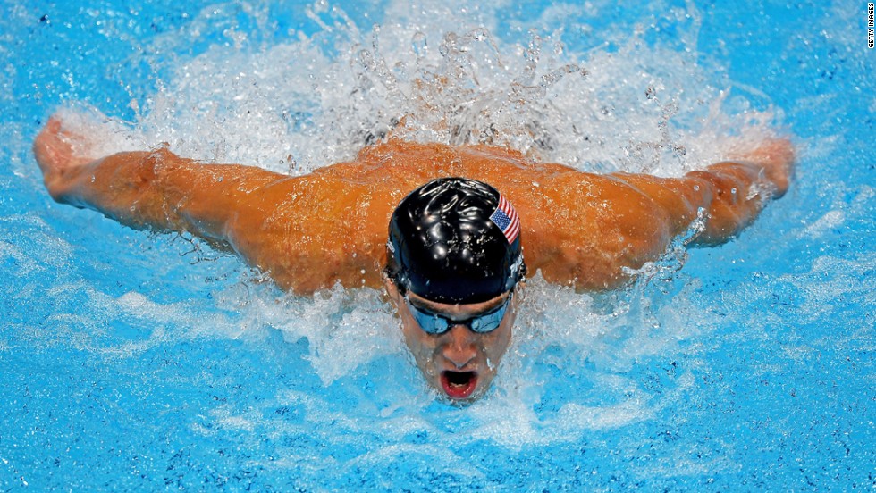 Michael Phelps competes in the men&#39;s 100-meter butterfly final.