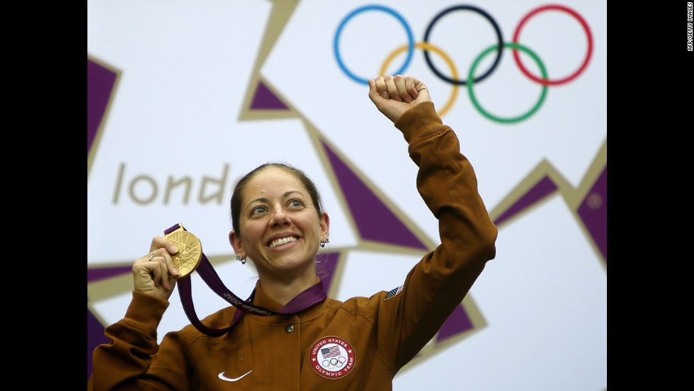 Gold medalist Jamie Lynn Gray of the United States celebrates on the podium after winning the 50-meter rifle 3 positions women&#39;s final Saturday, August 4.