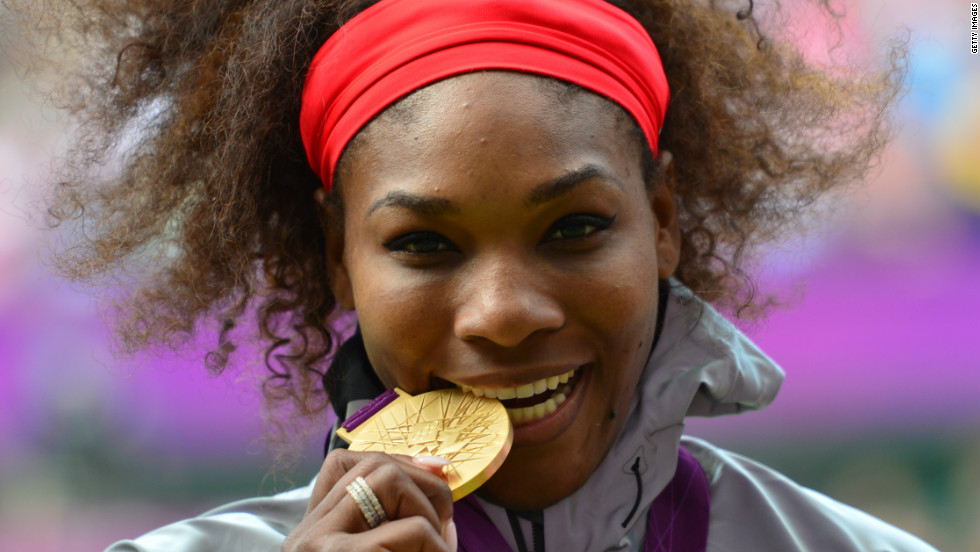Serena Williams takes the customary bite out of her Olympic gold medal for women&#39;s tennis singles. Williams won two gold medals during the London 2012 games, the second with her sister in the doubles final at Wimbledon. 