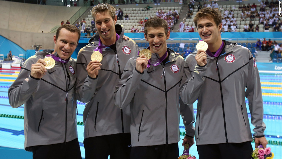 Left to right: Brendan Hansen, Matthew Grevers, Michael Phelps and Nathan Adrian pose following the medal ceremony for the men&#39;s 4x100-meter medley on Saturday, August 4.