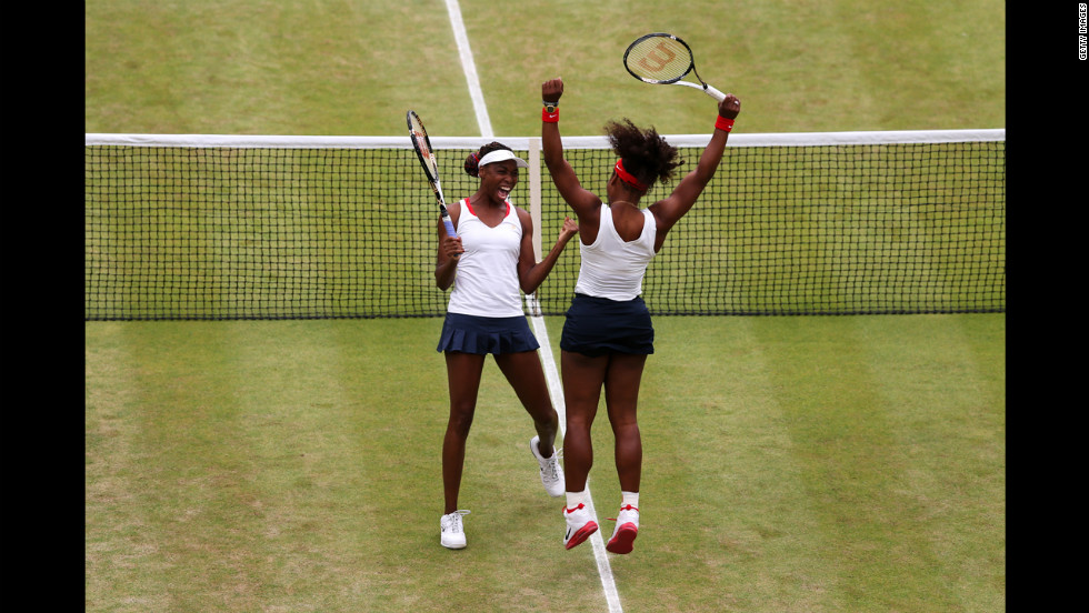 The sisters celebrate after their victory against the Czech players Sunday.