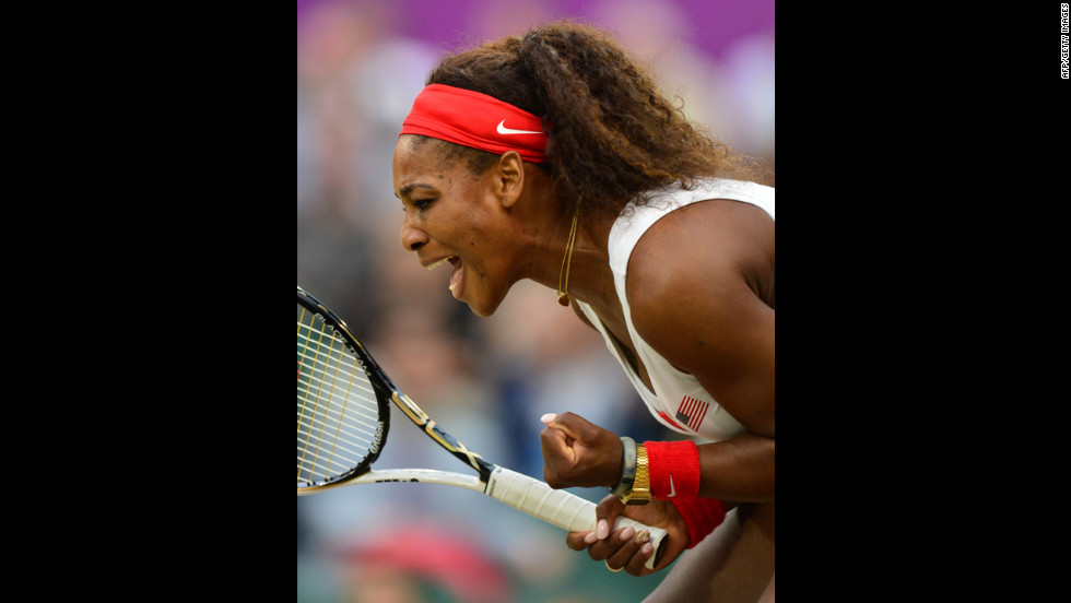 Serena Williams revels in the moment as she plays with her sister Venus against the Czech Republic&#39;s Andrea Hlavackova and Lucie Hradecka during the women&#39;s doubles gold medal match.