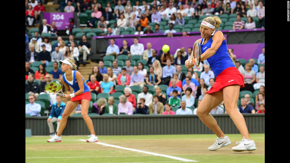 The Czech Republic&#39;s Andrea Hlavackova, left, and Lucie Hradecka, right, play against Venus and Serena Williams of the United States during the women&#39;s doubles gold medal match in Wimbledon.