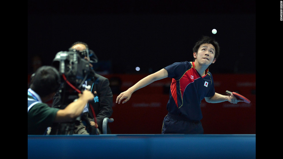 Japan&#39;s Koki Niwa serves to Hong Kong&#39;s Tang Peng during a men&#39;s team table tennis quarterfinal match.