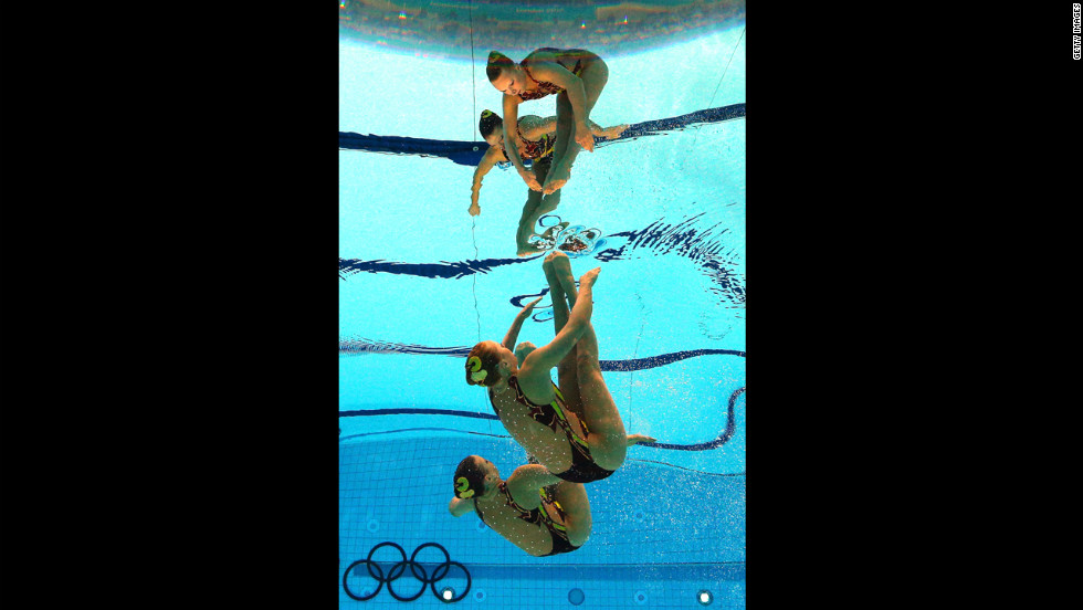 Mary Killman and Mariya Koroleva of the United States compete in the women&#39;s duets synchronized swimming technical routine.