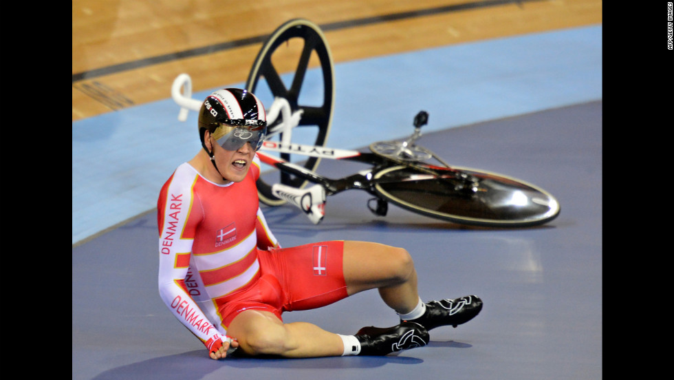 Denmark&#39;s Lasse Norman Hansen crashes during the men&#39;s 15-kilometer scratch race cycling event at the London Velodrome.