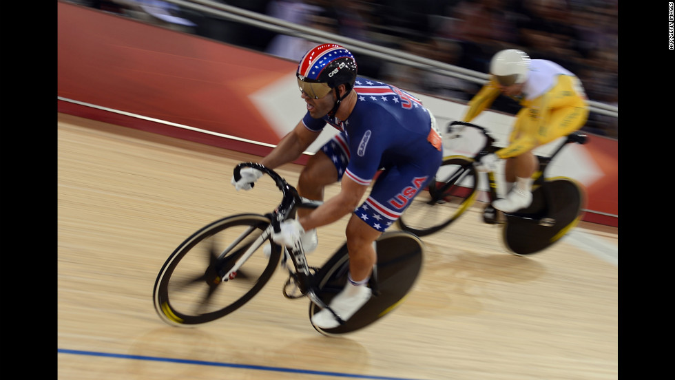 Jimmy Watkins, left, of the United States and Shane Perkins, right, of Australia fly around the track during the men&#39;s sprint quarterfinals cycling event.