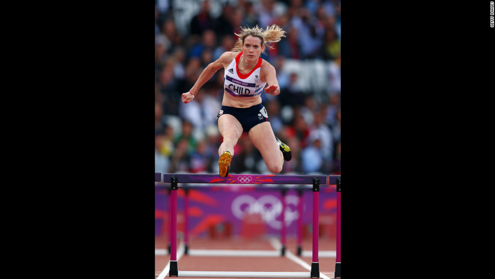 Eilidh Child of Great Britain clears a hurdle in the women&#39;s 400-meter hurdles round 1 heat.