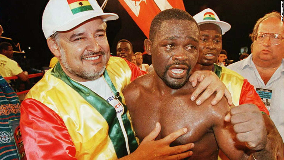 Nelson celebrates after retaining his Super Featherweight title by beating James Leija in Las Vegas, Nevada, in 1996.