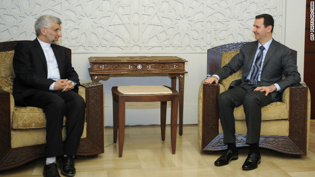 Syrian President Bashar al-Assad, right, meets with a top aide to Iran&#39;s supreme leader in Damascus on Tuesday.