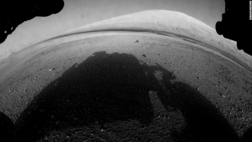 This is one of the first pictures taken by Curiosity after it landed. It shows the rover&#39;s shadow on the Martian soil.