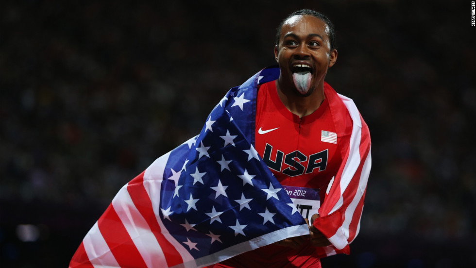 Aries Merritt of the United States celebrates after winning gold in the men&#39;s 110-meter hurdles final.