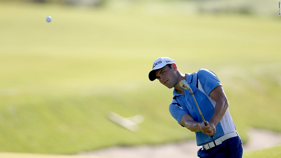 Kaymer hits a shot on the 11th hole.