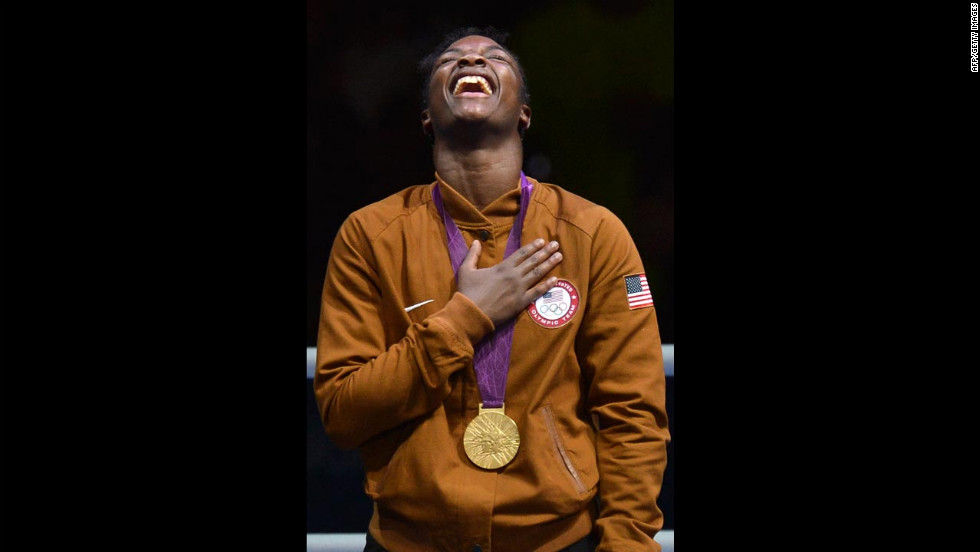 Shields laughs on the podum after receiving her gold medal.