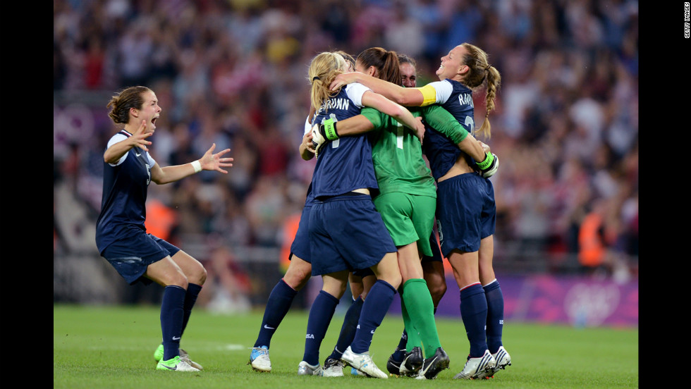 The United States women&#39;s soccer team begins the celebration after defeating Japan, avenging its 2011 World Cup final loss.