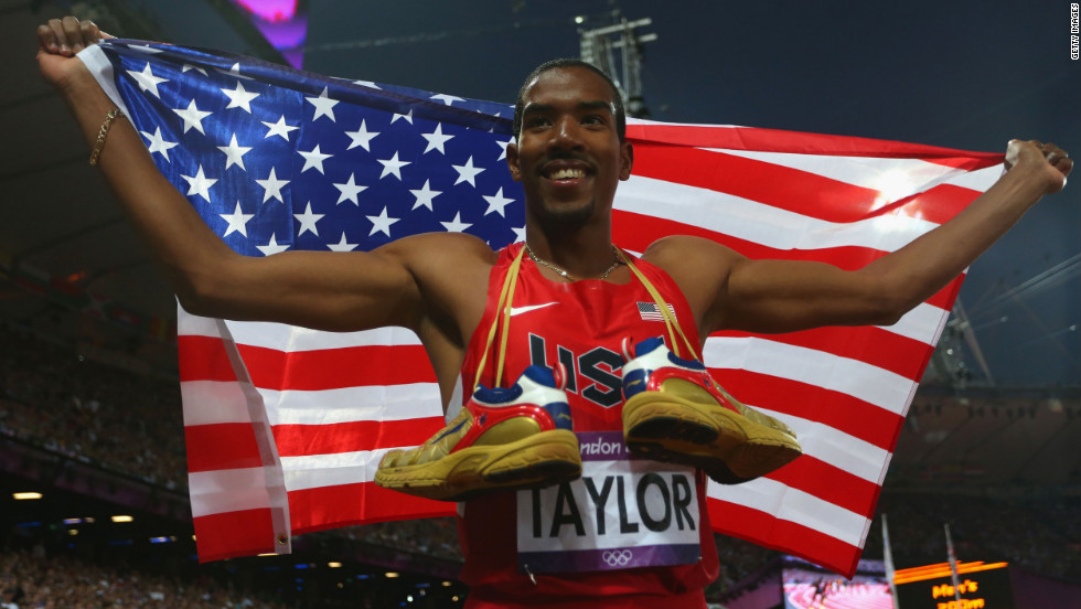 Christian Taylor of the United States celebrates after winning gold in the men&#39;s triple jump on Thursday.