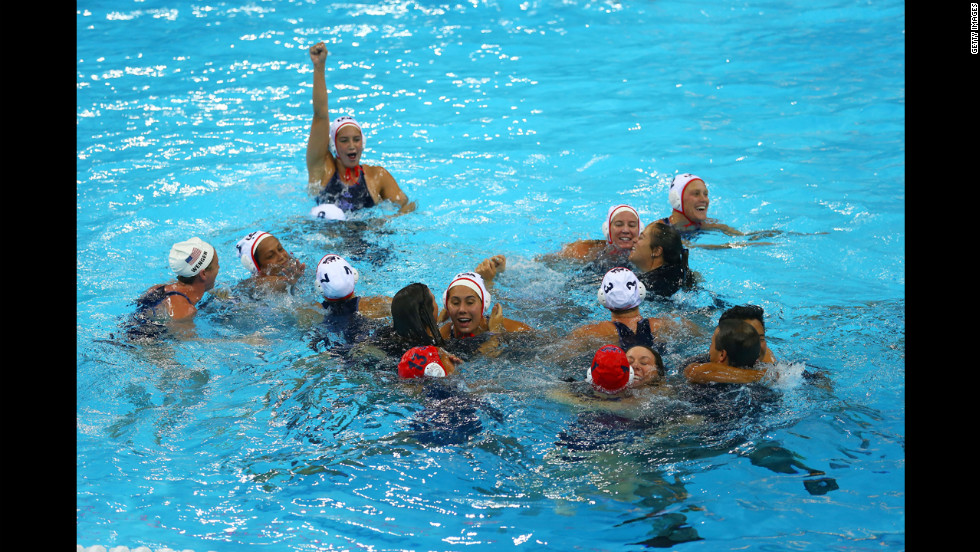 The U.S. team celebrates its gold medal win at the Water Polo Arena in London.