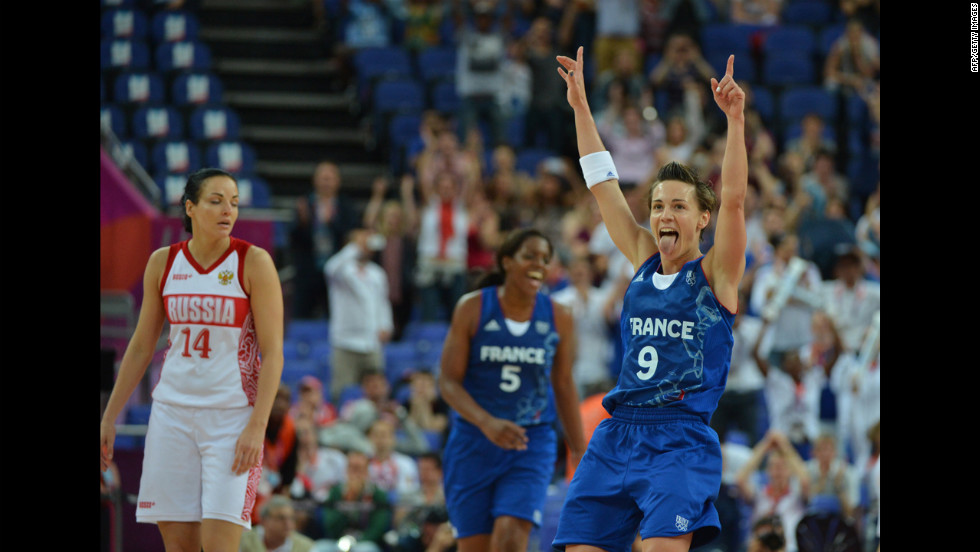 French guard Celine Dumerc celebrates after winning 81-64 against Russia during the women&#39;s semifinal basketball game between Russia and France.
