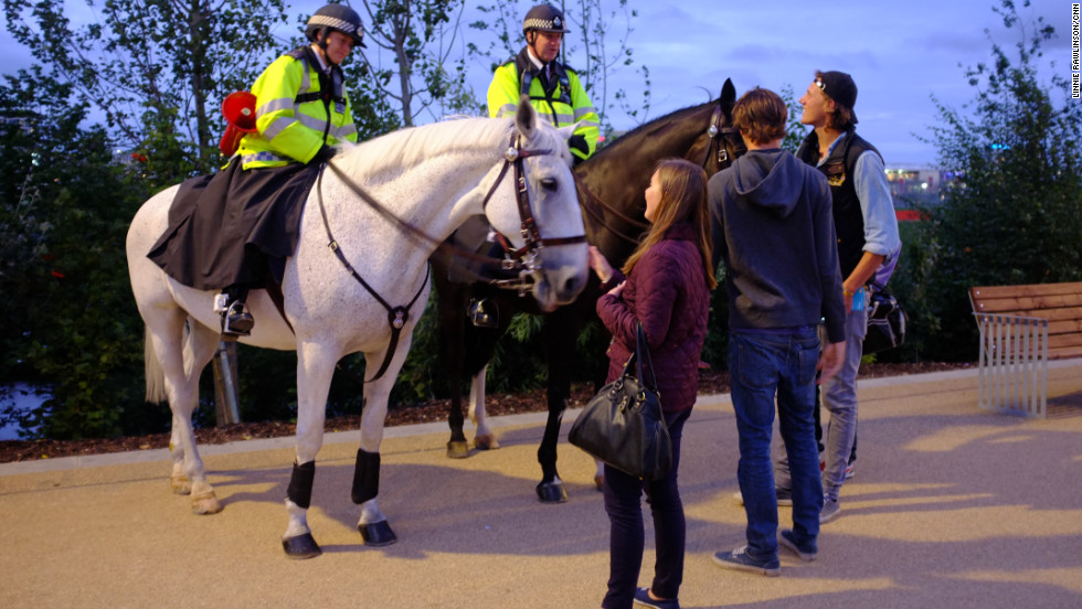 In the absence of large crowds, mounted police officers had time to chat to spectators - who took the opportunity to admire their horses, too.