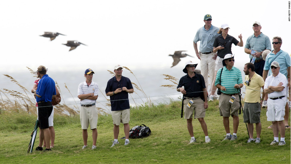 Golf fans watch during the second round of the championship.