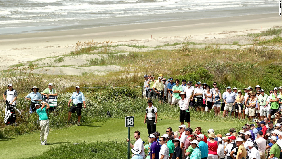 Graeme McDowell hits off the 18th tee.