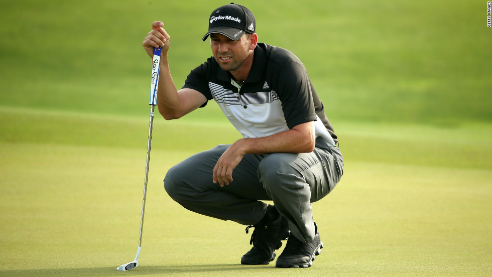Spanish golfer Sergio Garcia lines up a putt on the 10th green.
