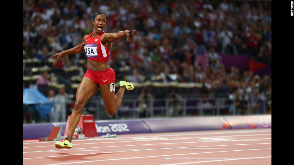 Carmelita Jeter of the United States celebrates winning gold in the women&#39;s 4x100-meter relay.