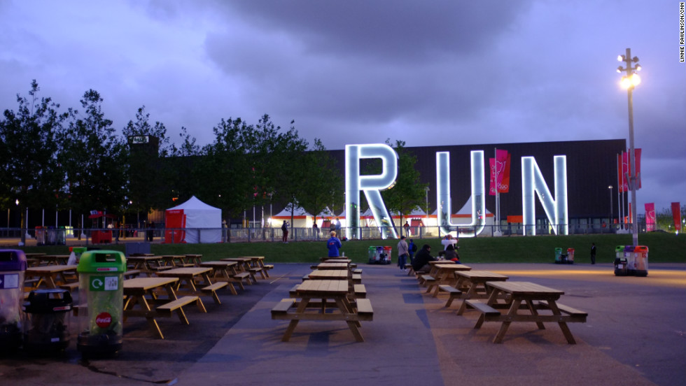 The picnic area outside the Copper Box, crowded earlier in the day, was almost deserted at dusk. Artist Monica Bonvicini&#39;s permanent sculpture, &quot;Run,&quot; shone brightly in front of it. The venue will become a multi-purpose venue for community and sporting events. 