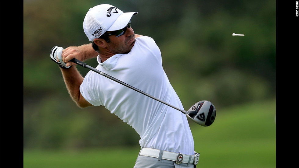 Trevor Immelman of South Africa hits a tee shot during round two.