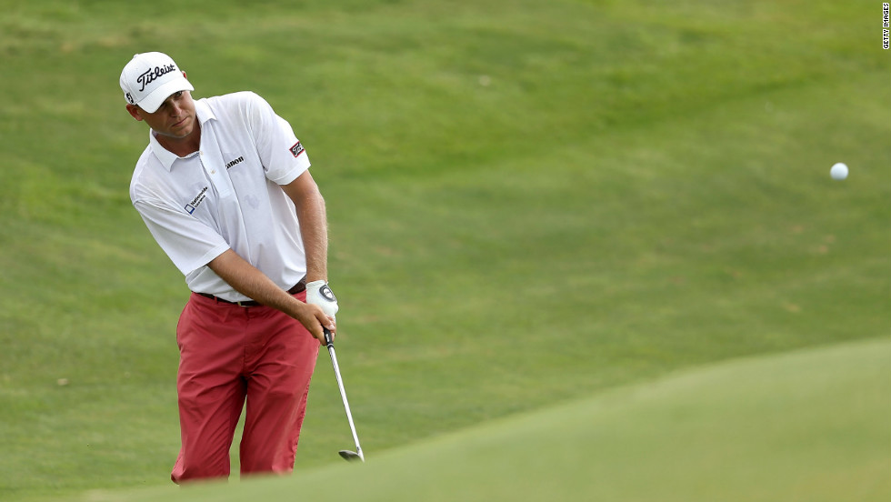 Bill Haas of the United States hits a shot on the seventh hole during round three.