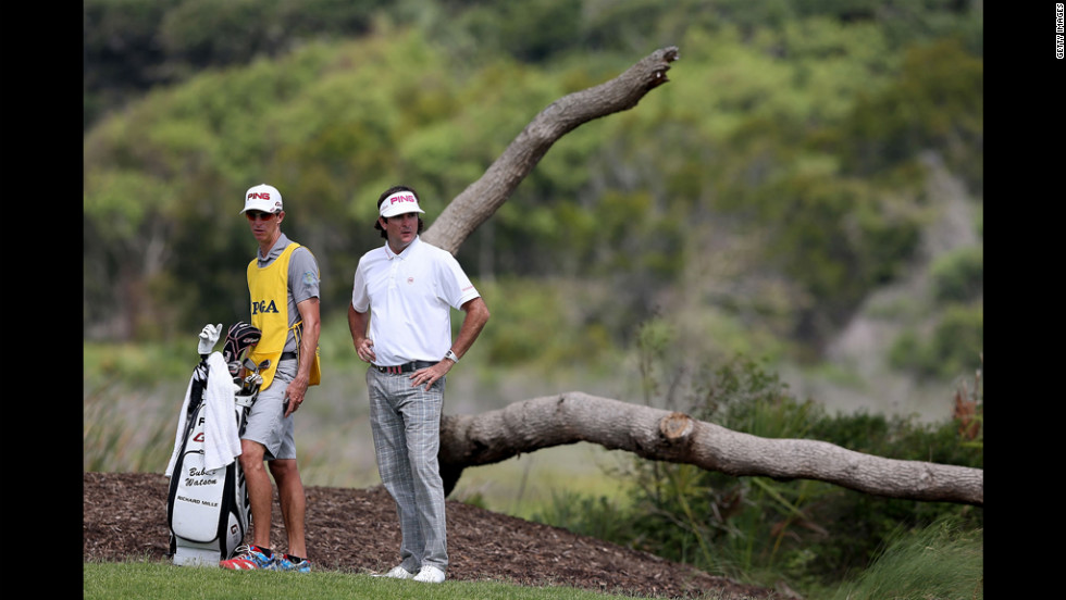 Bubba Watson of the United States prepares to hit a shot on the second hole.