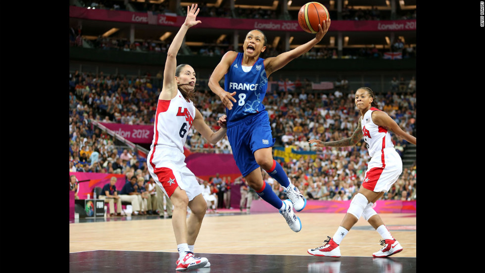  France&#39;s Edwige Lawson-Wade, in blue, goes up for a shot against Sue Bird in the second half.