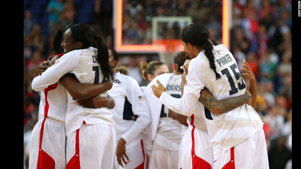 Members of the U.S. women&#39;s basketball team celebrate after defeating France in London 2012, to continue a 41-game winning streak stretching back 20 years. 