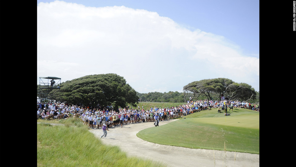Fans watch the pairing of Graeme McDowell and Phil Mickelson on Saturday.