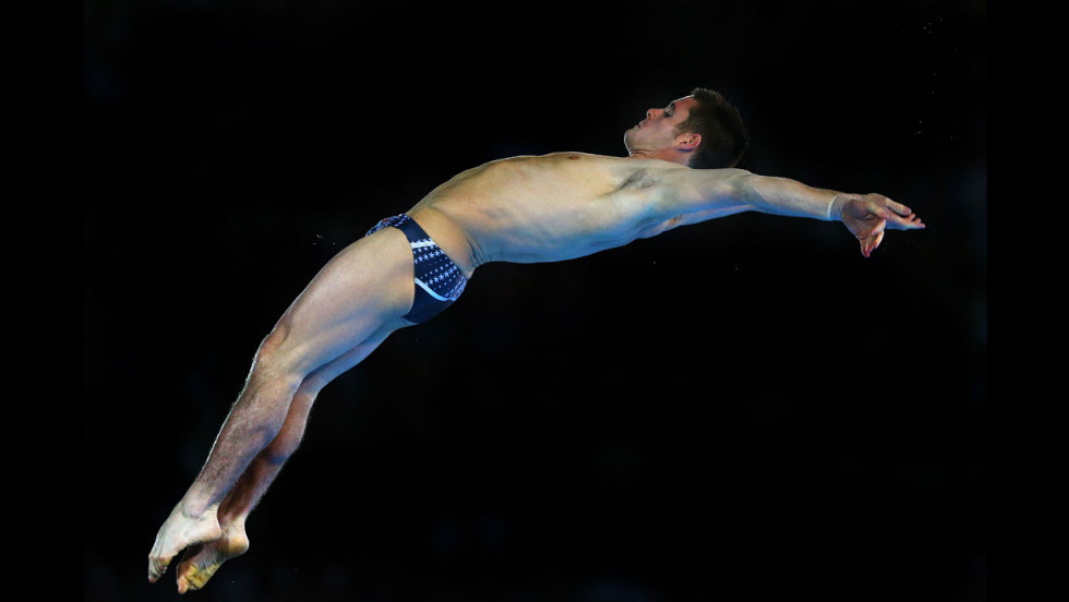 American David Boudia performs a dive in the the men&#39;s 10-meter platform diving final. He won gold with China&#39;s Bo Qiu taking silver and Great Britain&#39;s Tom Daley winning bronze.