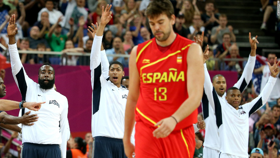 With victory in sight, U.S. players players come off the bench near the game&#39;s end as Marc Gasol of Spain walks off.