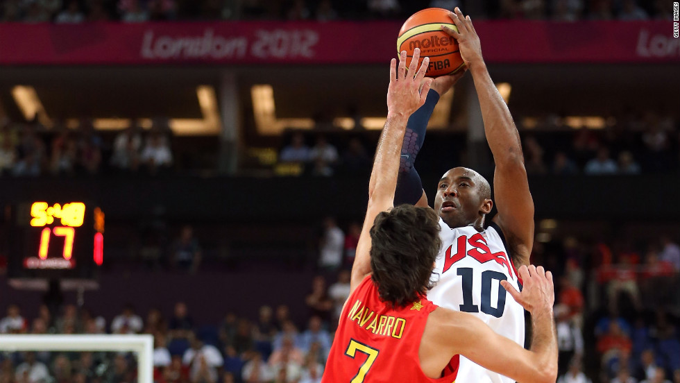 Kobe Bryant of the United States shoots a three-point shot over Juan-Carlos Navarro of Spain.