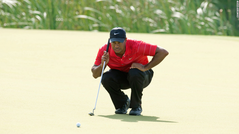 Tiger Woods lines up a putt during the third round.