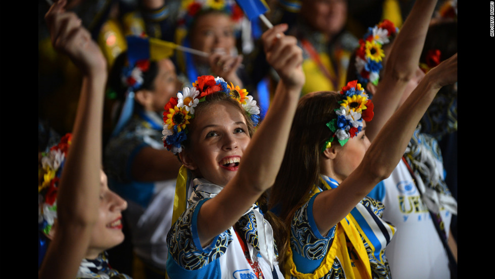 Girls perform at the Olympic stadium during the closing ceremony.