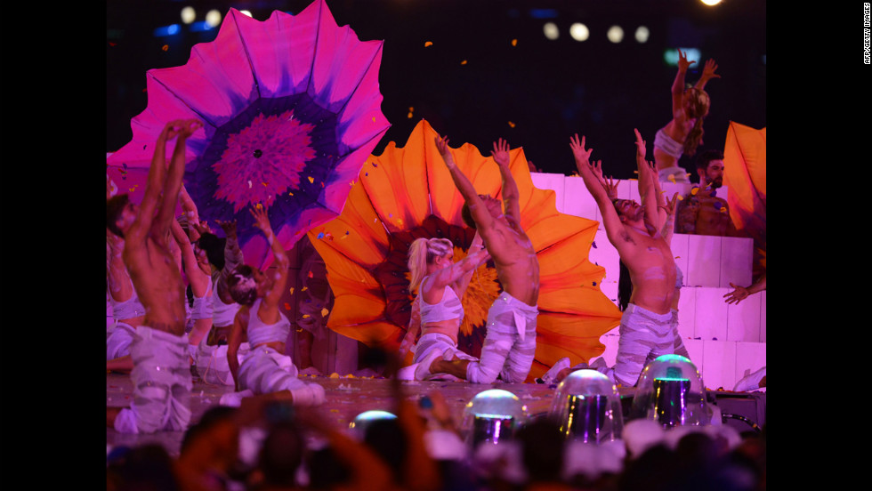 Artists perform at the Olympic stadium.