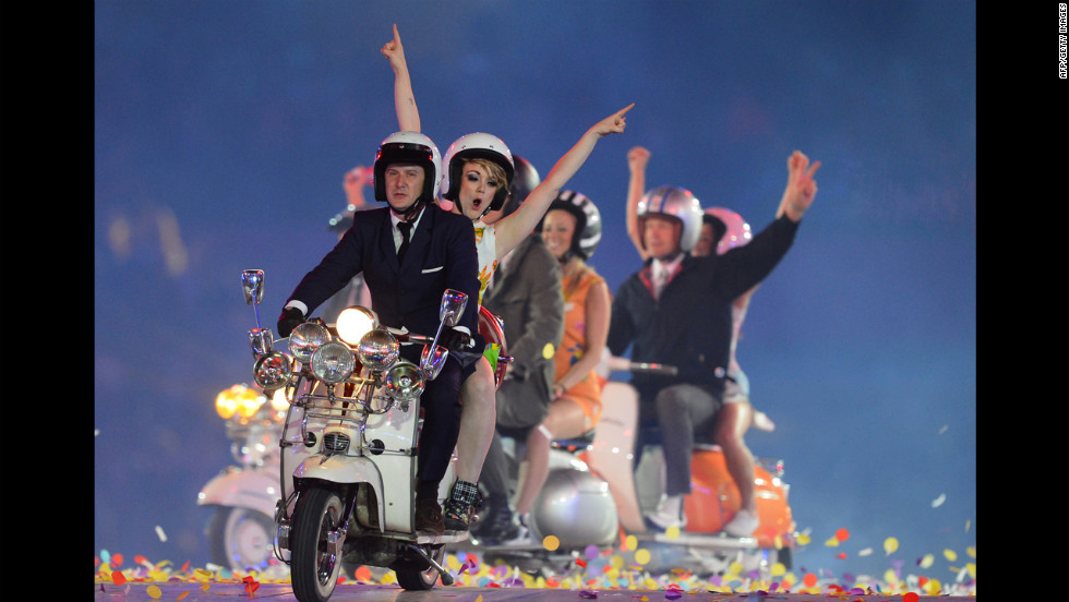 Artists perform at the Olympic stadium.